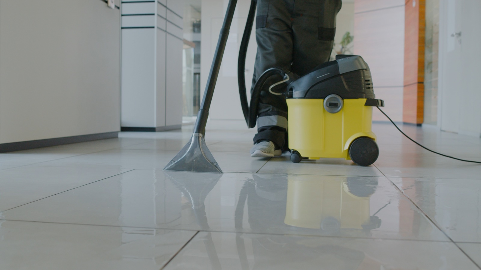 Vacuuming a floor, from MintHome’s existing service video
