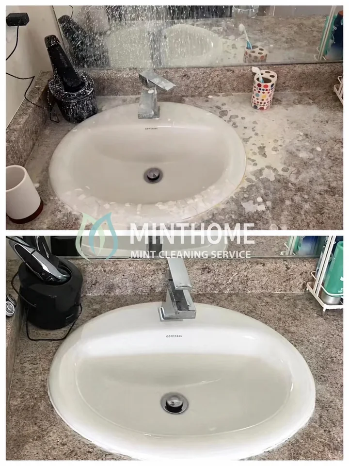 A fresh start at the sink — The sink, counter and mirror in a bathroom clean.